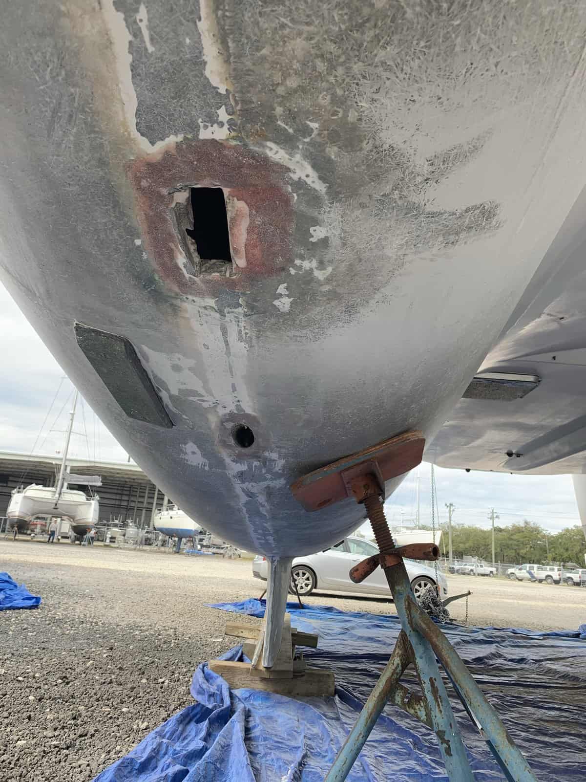 holes on the hull of a sailboat