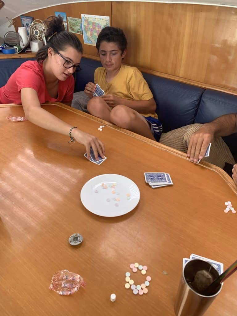 kids playing cards aboard