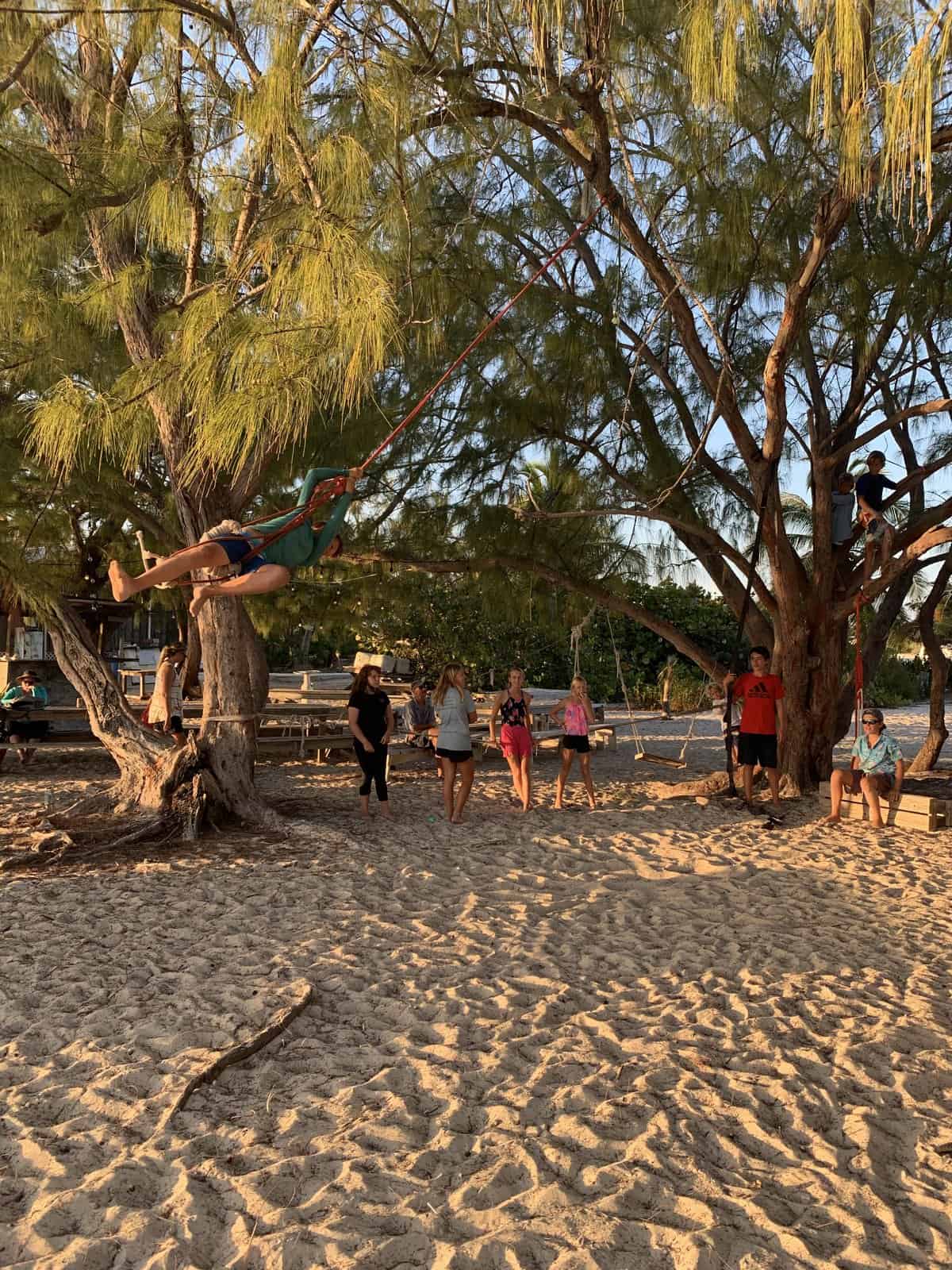 Georgetown, Bahamas beach full of kids playing