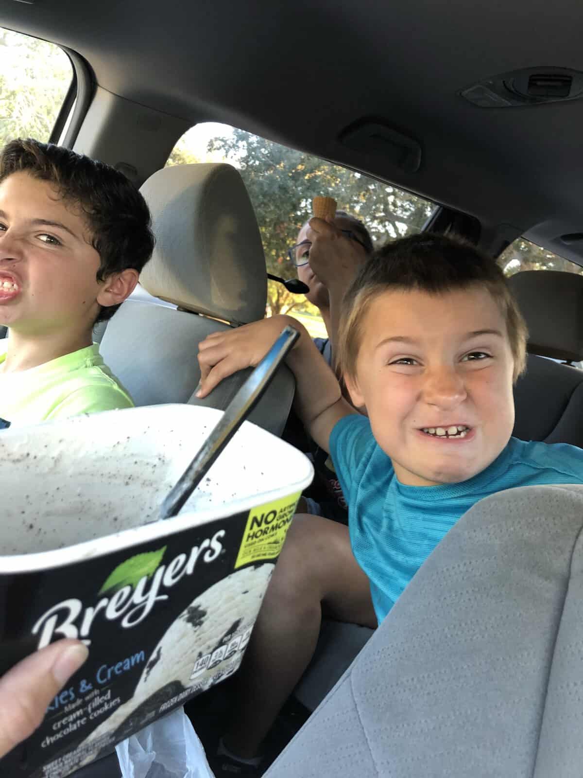 eating ice cream in the car, everyone happy.