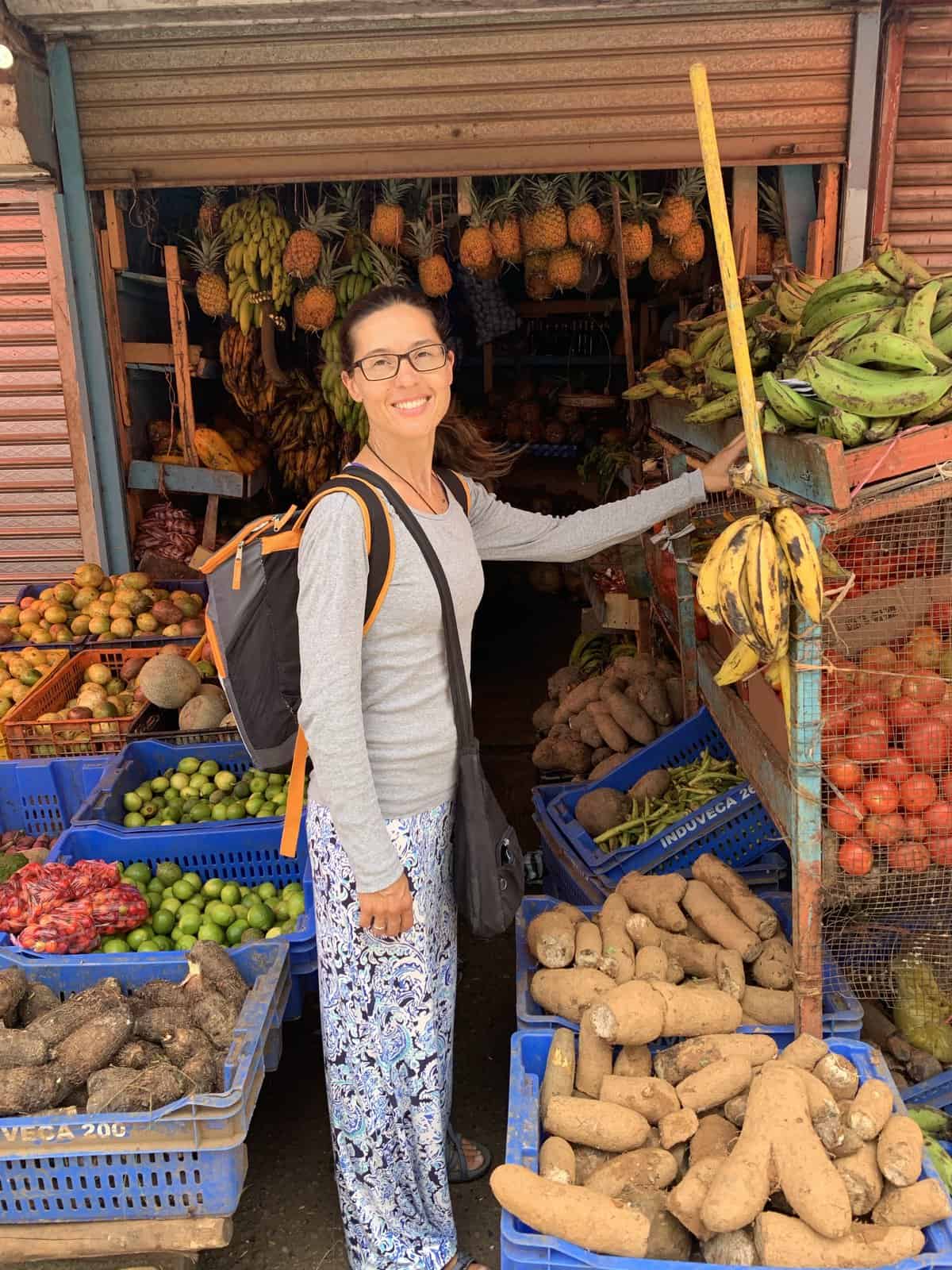 a woman at a produce market in Samana
