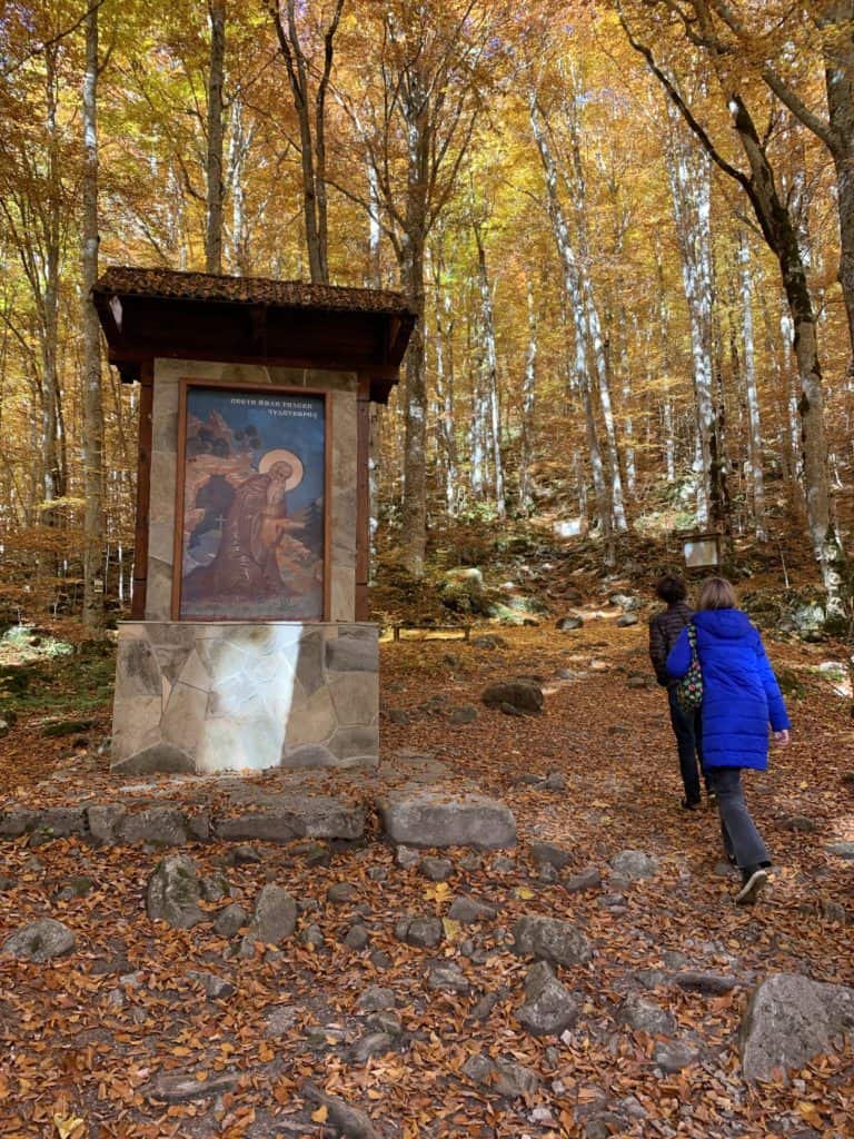 The icon of St. John of Rila sign marking the path leading to the cave