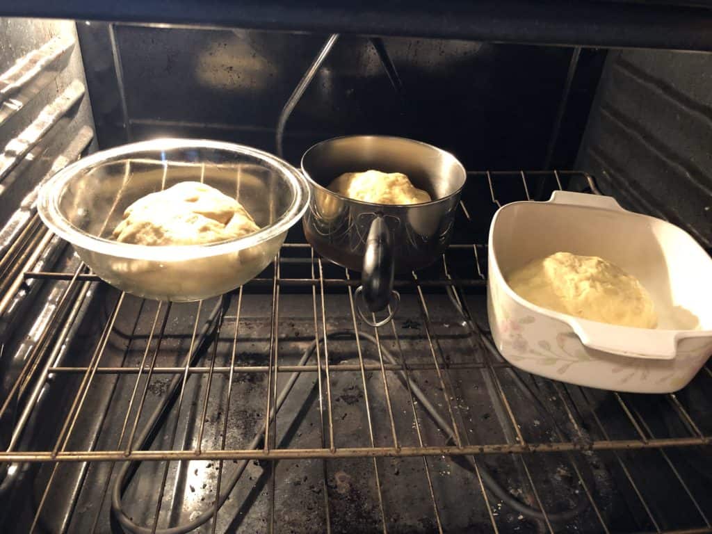 bread dough in pans, in the oven, before they rise. Suggesting a blog without a good SEO