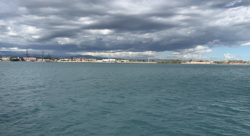 Ponce main anchorage showing industrial buildings in the background.
