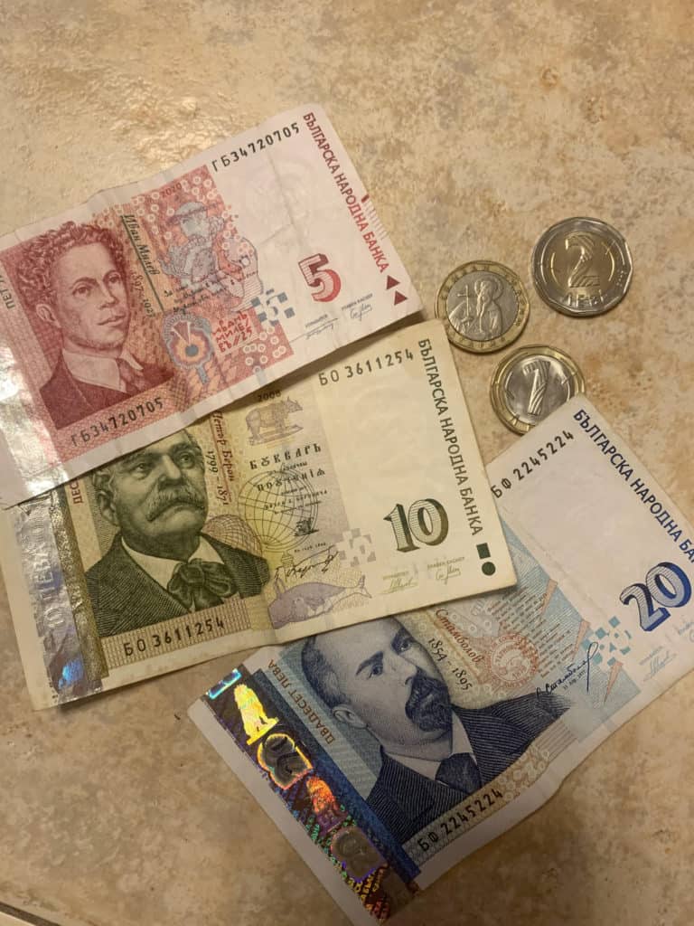 World-schooling in Bulgaria means learning a whole new currency. A few BUlgarian Leva and coins.