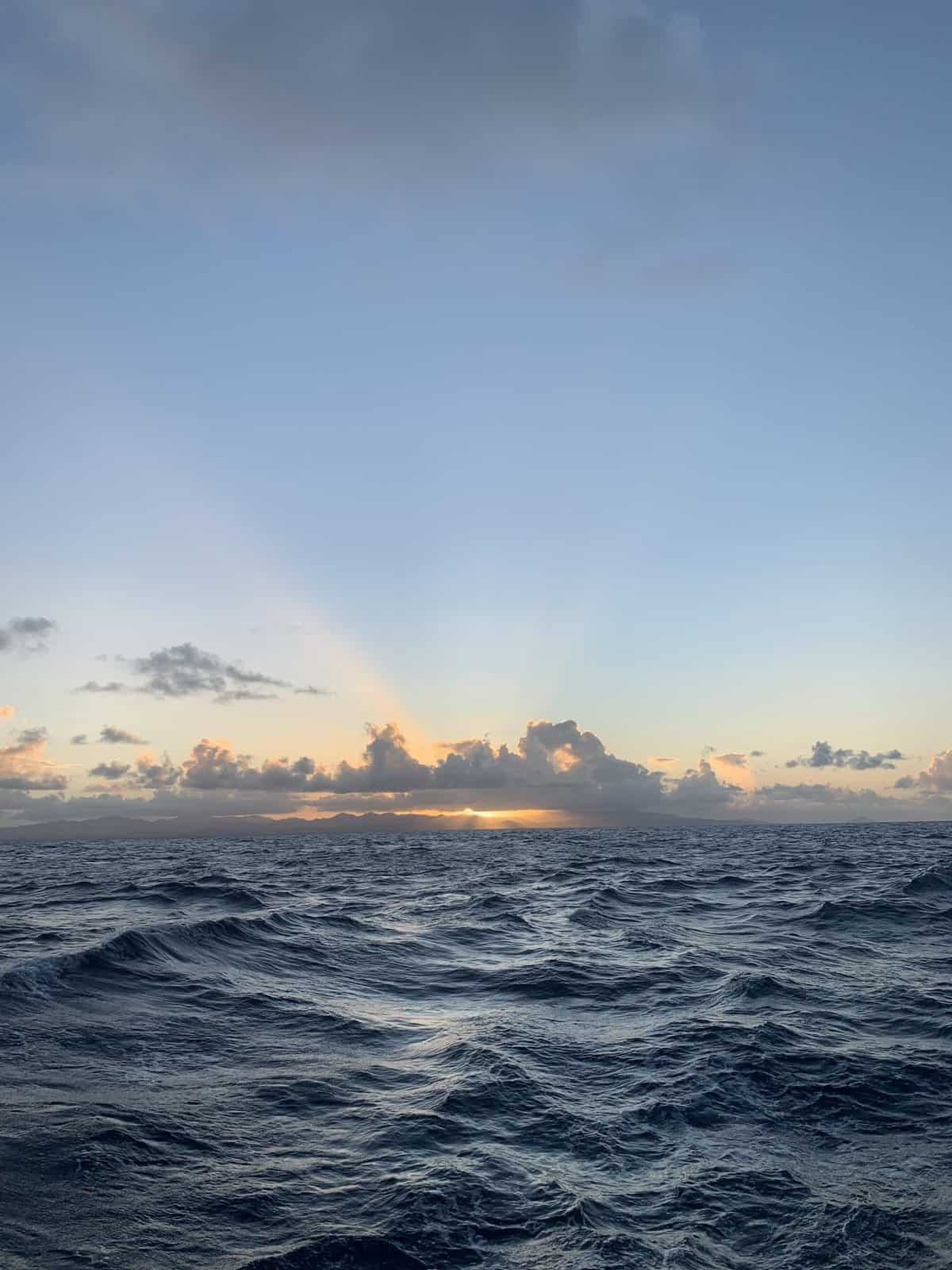 Sunset on the water while sailing the Mona Passage
